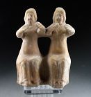 Intact Greek terracotta figural group of seated females 4th. cent. BC