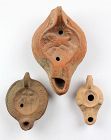 Lot of three fine Roman pottery oil lamps, 2nd.-4th. century AD