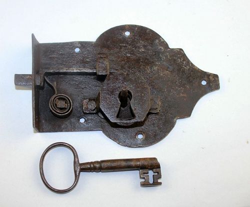 Choice working 17th. century iron lock with key from cupbard