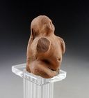 Terracotta figure of a naked fat erotic god, Roman, 1st.-3rd. cent. AD