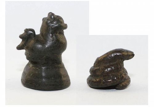 Pair of early bronze opium weights of Lion and Snake, Laos & Burma