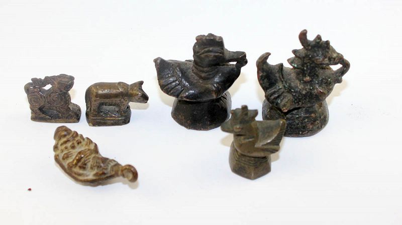 Lot of 6 South East Asian bronze opium weights and amulets