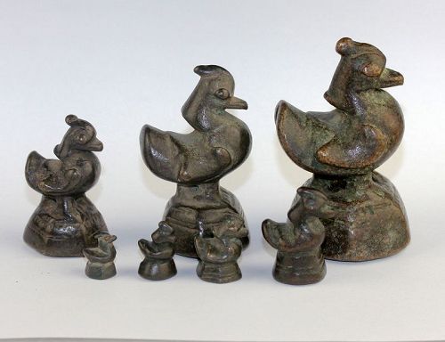 Matched set of 7 bronze opium weights, Burma, Shan state, c. 1780