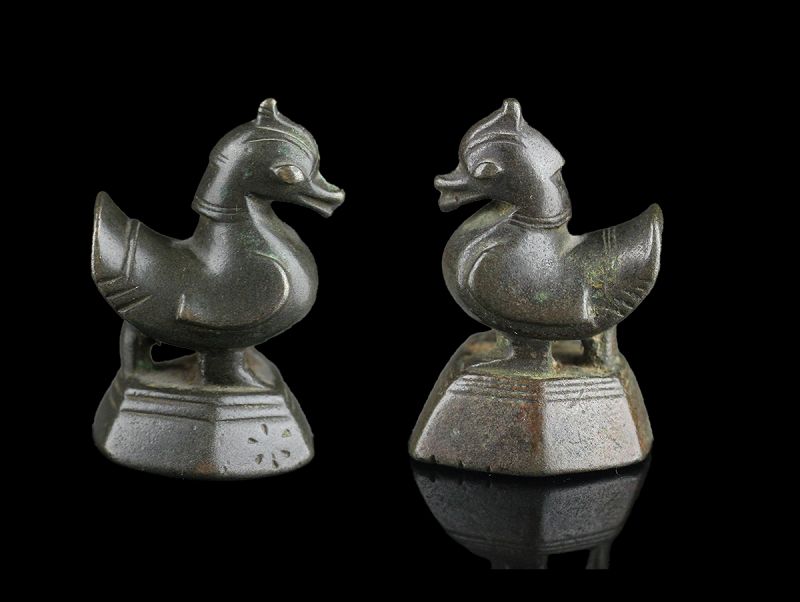 Scarce and choice pair of large Hamsa opium weights w open beaks!