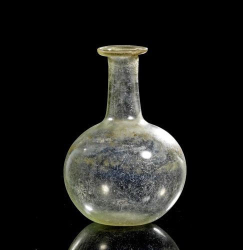 Choice hemispheric Roman clear glass flask 1st.-3rd. century AD
