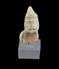 A rare ceramic bust depicting a Parthian warrior, late 1st. mill. BC