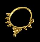 Early Byzantine Gold bow earring with granules decoration, 5th.-6th. c