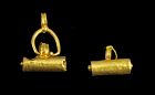 Pair of Roman gold pendants depicting Bullas,1st.-3rd. cent. AD