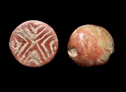 A pinkish-red stone stamp seal, Mesopotamian, Late Ubaid-Uruk period