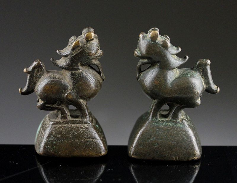 Pair of nice massive bronze chinte opium weights of 20 Tical, Burma!