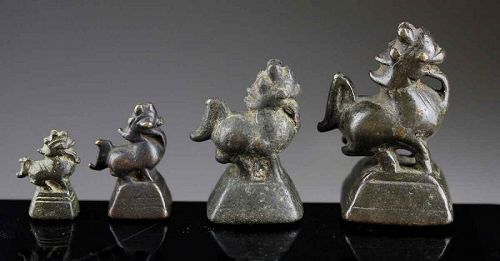 Nice set of 4 different Chinte / Toe bronze opium weights, 18th. cent.
