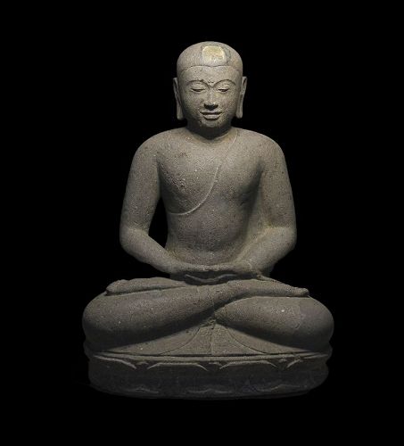 Museum Quality stone figure of the seated Buddha, Java 8th.-9th. cent