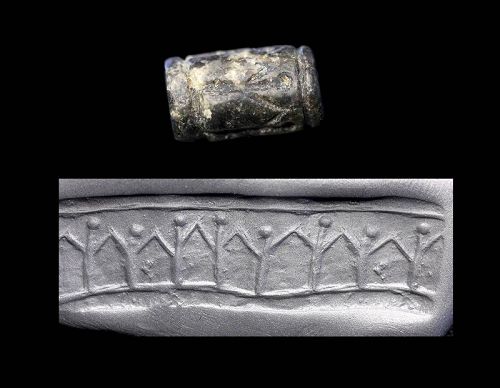 Choice blackstone cylinder seal w engraving of friendship, Mesopotamia