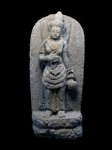 Hindu vulcanic stone stele with female deity, Java, c. 9th. cent. AD