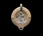 Choice Roman terracotta oillamp - Eros holding the arms of Mars!