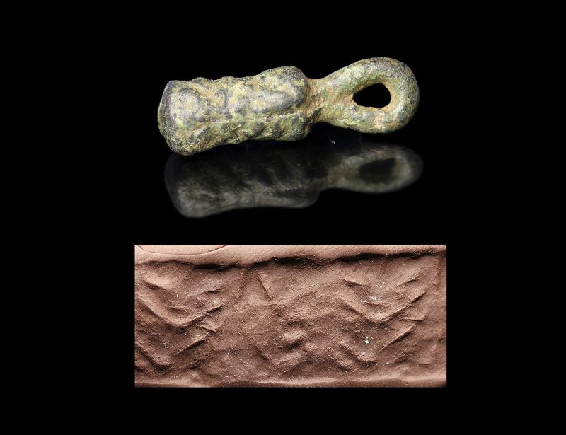 Mesopotamian 'knot-shaped' bronze cylinder seal amulet, 2nd. mill. BC
