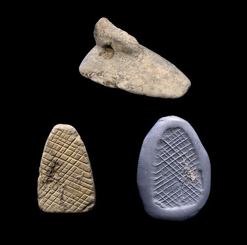 Triangular stamp seal w handle, Mesopotamia, Halaf, 6th.-5th. mill. BC