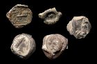 Coll. of 5 choice Roman metal and pottery bullae, 1st.-3rd. cent. AD