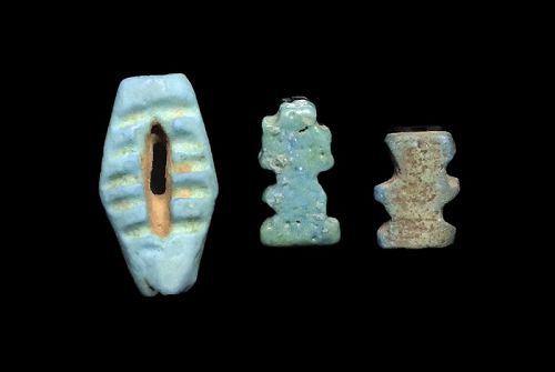 Lot of three fine Egyptian faiance amulets, incl. Djetpillar