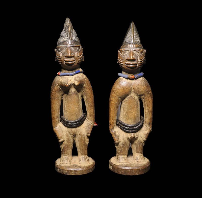Pair of male and female Yoruba wooden Twins, Nigeria,19th. cent