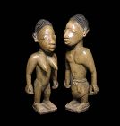 Pair of early elaborate Yoruba Ibeji twin figures, Nigeria, 19th. cent