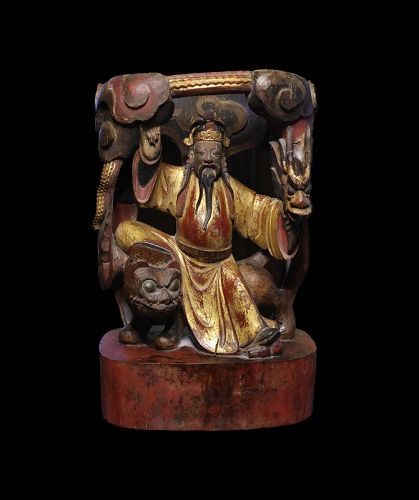 Elaborate Chinese wooden carving of deity on tiger, late Qing dyn