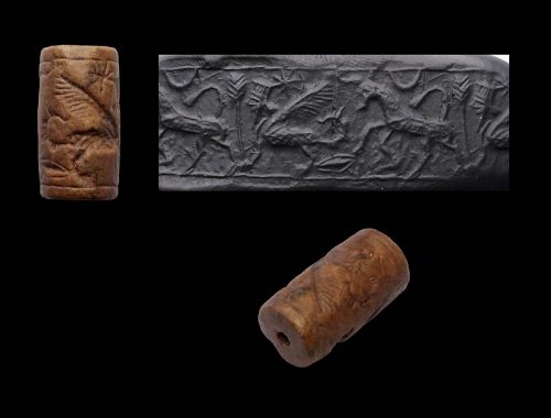 Lovely Late Assyrian cylinder seal in red stone, c. 10th.-8th. cent.BC