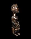 Important large seated wooden Female Figure, Baulé 19th. cent.