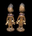Large early wooden Yoruba Ibeji twin figures, Nigeria, 19th. cent.