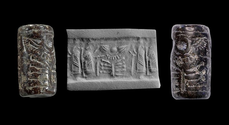 Nice Neo-Assyrian black stone cylinder seal, 9th.-7th. cent.BC