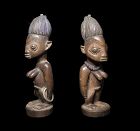 Early wooden Yoruba Ibeji female twin figures, Nigeria, c.19th. cent.