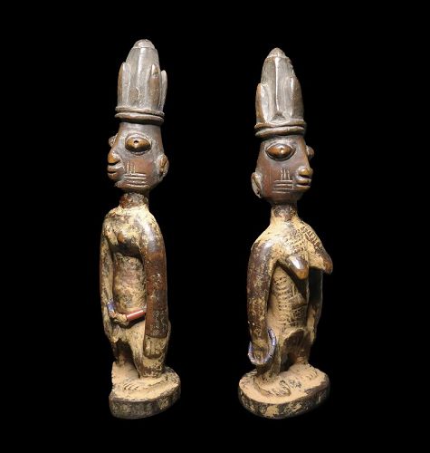Early wooden Yoruba Ibeji male and female twins Nigeria, 19th. cent.
