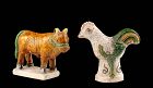 A fine pair of Tomb pottery Figures of a Cow & Sheep, Ming Dynasty