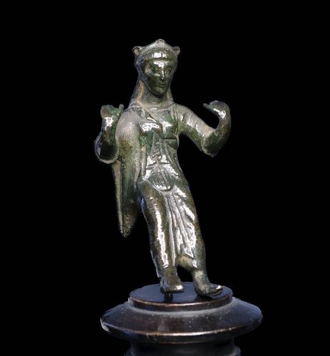 Rare archaic bronze figure of seated Kore, Etruscan c. 7th. cent. BC