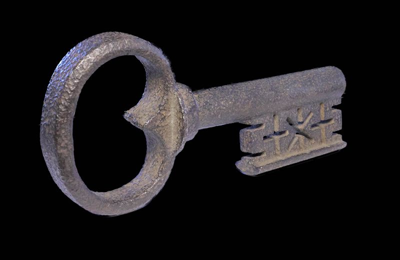 Massive and attractive iron strong box key, European, 16th. cent.