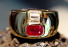 Solid 18K. Gold Ring set with Ruby and tapered Diamonds