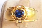 Solid 18 K. Gold Ring with Blue Sapphire & Diamonds