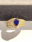 Solid 18K. Gold Ring set with Blue Sapphire & Diamonds
