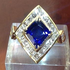 Stunning Fancy Cut Blue Sapphire Ring with Diamonds