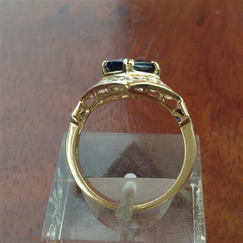 Stunning Fancy Cut Blue Sapphire Ring with Diamonds