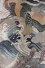 JAPANESE POLYCHROME OBI DEPICTING PHOENIX, WAVES AND PEACOCK FEATHERS