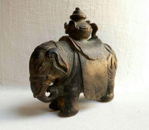 QING DYNASTY BRONZE ELEPHANT WITH CEREMONIAL VESSEL