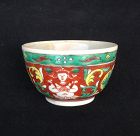 BENJARONG TEA CUP DEPICTING THEPANOM ANGEL/FLOWERS, 18TH CENT.