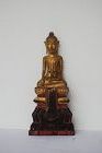 VERY SERENE ANTIQUE LANNA GILT WOODEN BUDDHA, 19TH CENTURY, THAILAND