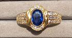 18K.GOLD RING SET WITH GORGEOUS BLUE CEYLON SAPPHIRE AND DIAMONDS