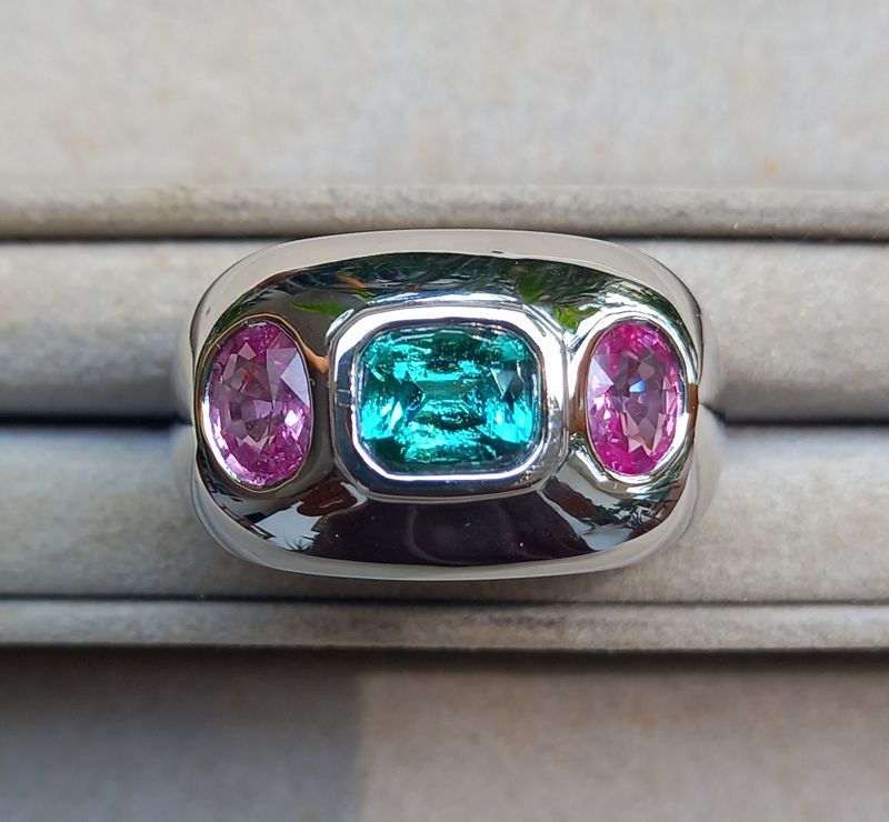 A Silver Ring set with 1 Tourmaline and 2 Pink Sapphires