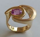 Avant Garde 18 K. Gold Ring set with 1 Genuine Pink Ceylon Sapphire