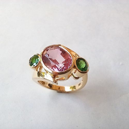 A Genuine 18K.Gold Ring set with a Pink Topaz & 2 Tsavorites