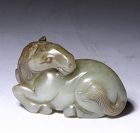 A Genuine CHINESE JADE RECUMBENT HORSE ORNAMENT, late MING/QING