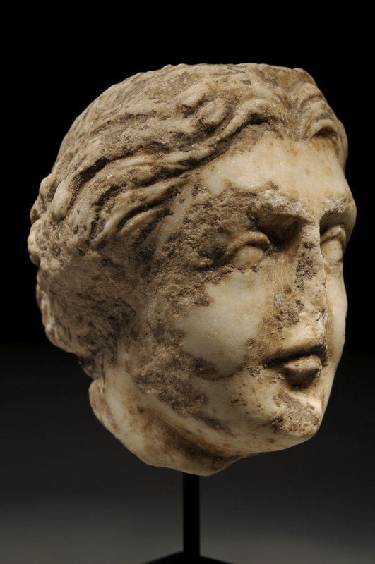 Ancient Roman marble female head, 100 - 300 AD